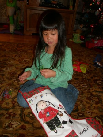 Kasen looking in her stocking